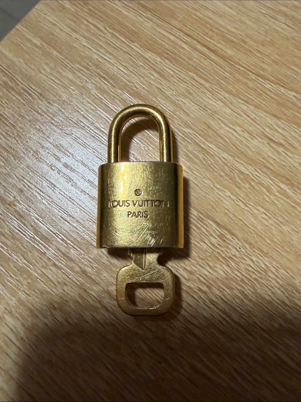 Louis Vuitton Gold Padlock Keyed Accessory